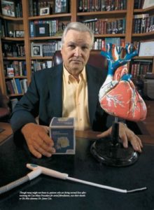 James Cox with a model of the heart